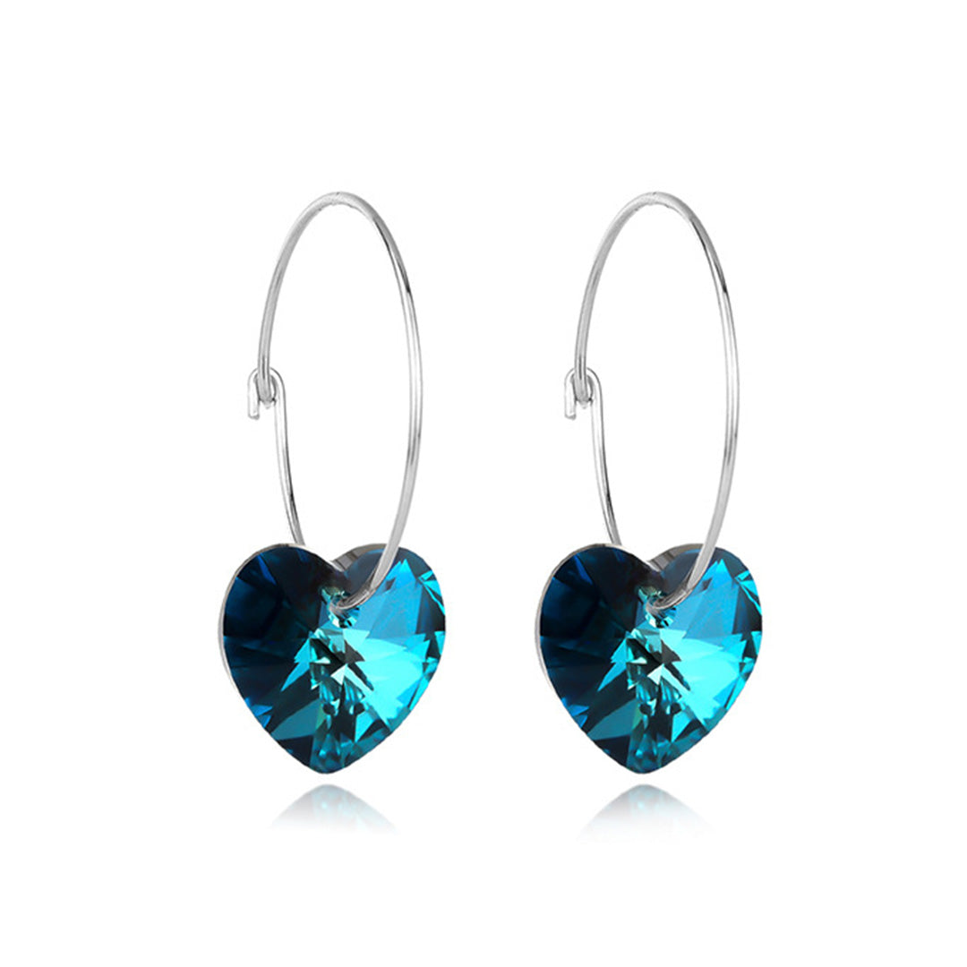 Silberschmuck von Swarovski Elements Ohrringe mit Silber und blauem Herz Anhänger.